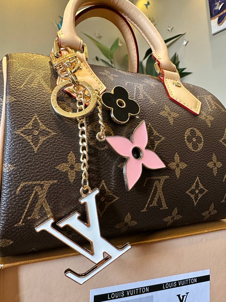  a decorative keychain on a handbag 
